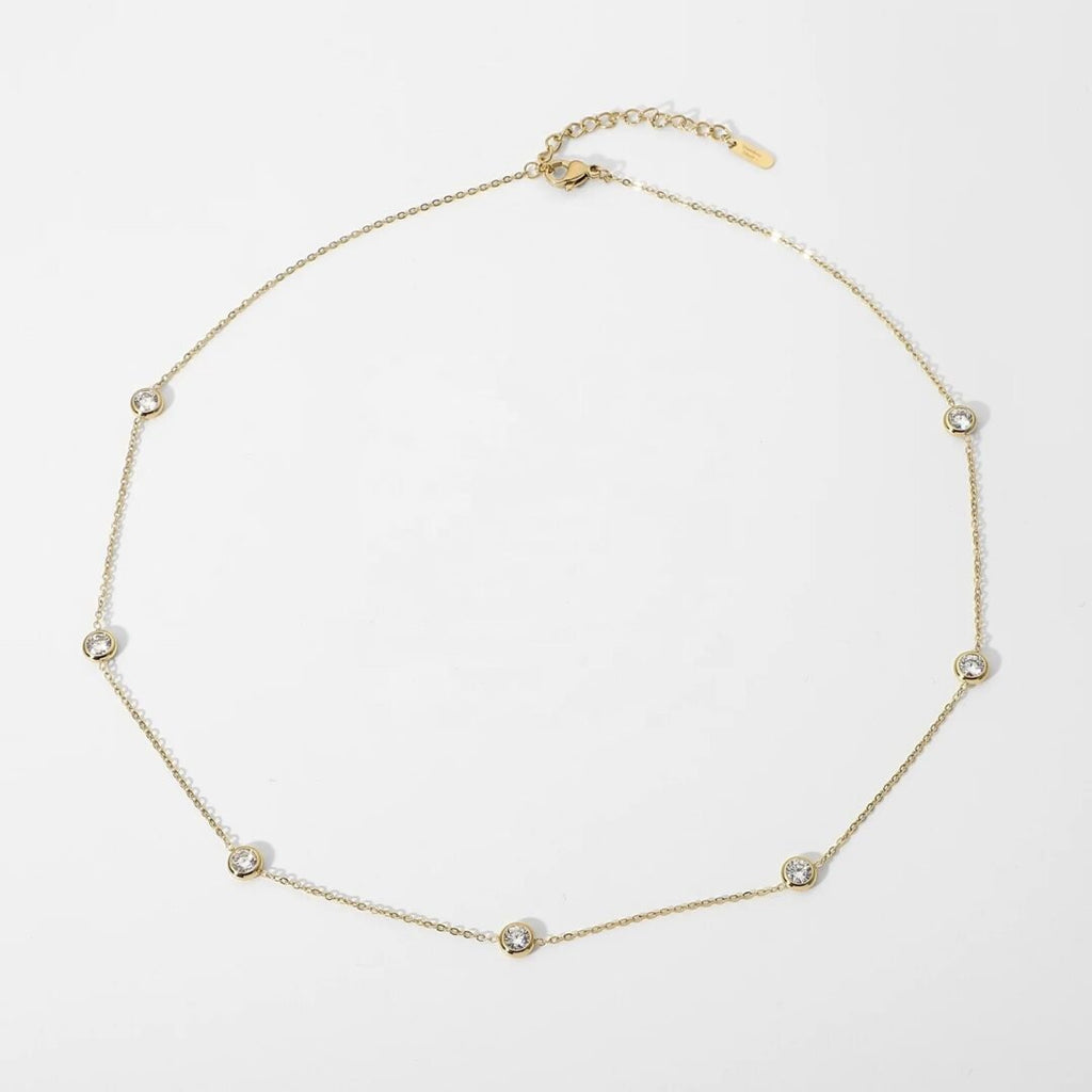 Jewel — white zircon solitaire pendant necklace in 14k gold-plated stainless steel, front view