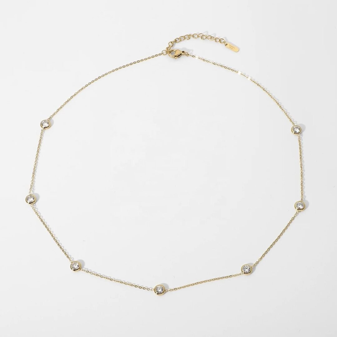 Jewel — white zircon solitaire pendant necklace in 14k gold-plated stainless steel, front view