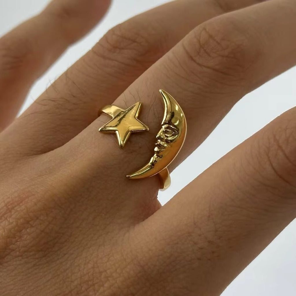 Star and Moon Ring — star and moon ring worn on the finger