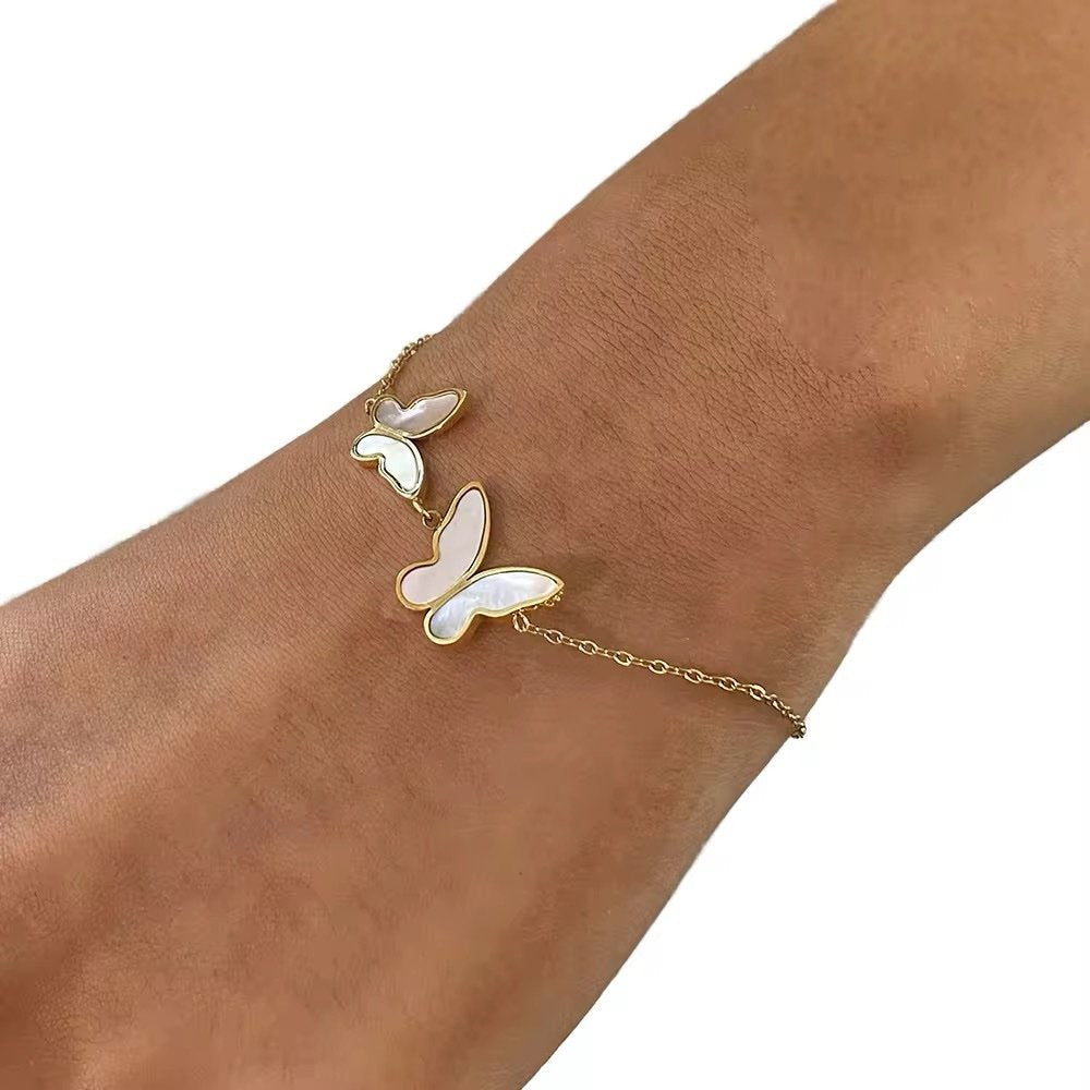 Butterfly Bliss — butterfly chain bracelet in 18k gold-plated stainless steel, front view