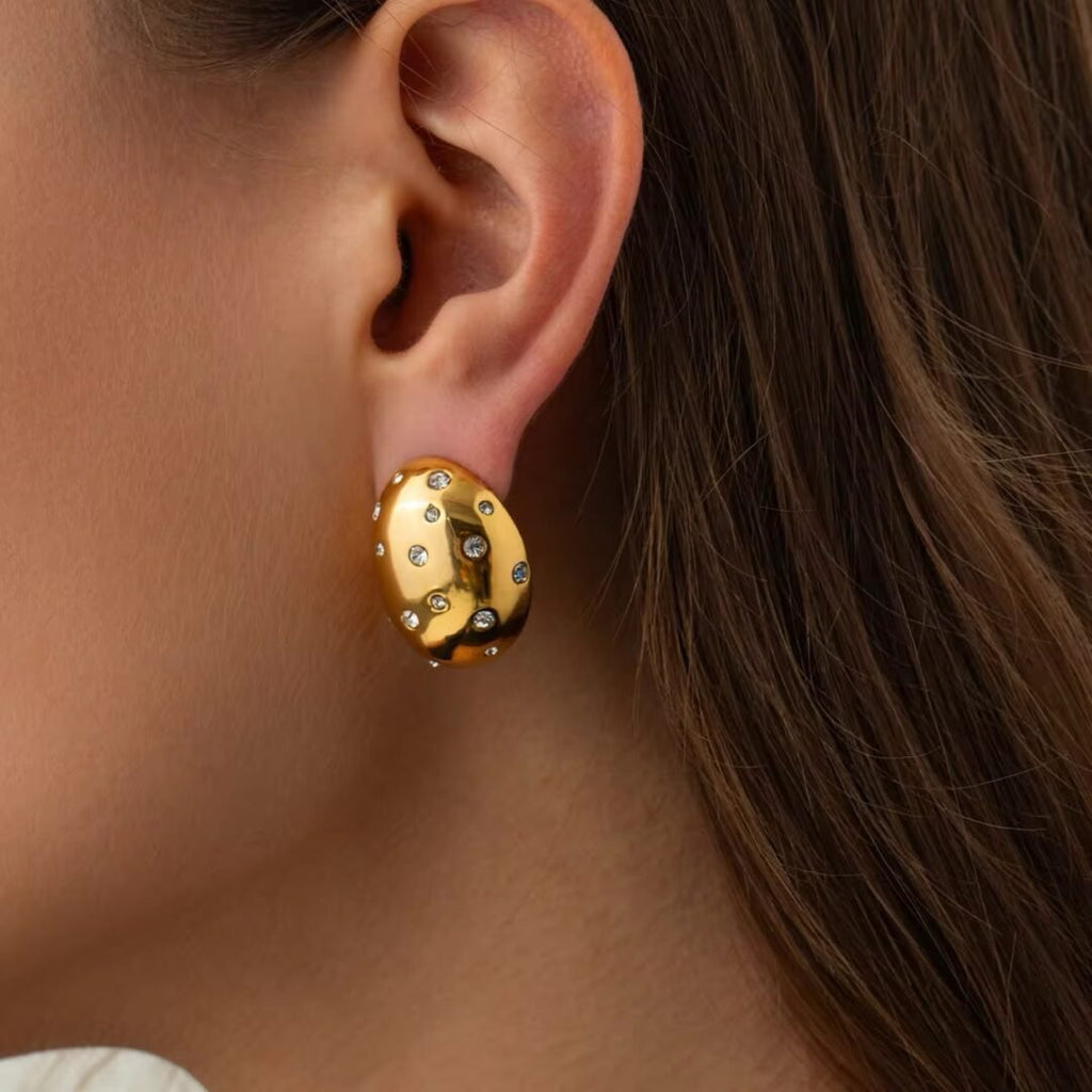 Serephina’s Nest — nest-setting zircon earrings worn on the ear