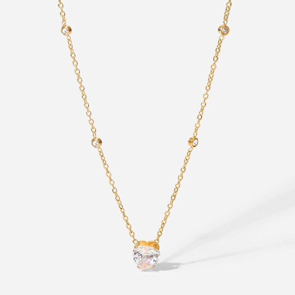Zircon Heart Necklace — zircon pavé heart pendant in 18k gold-plated stainless steel, front view