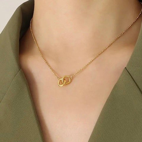 Intertwined — interlocking loop pendant, close-up