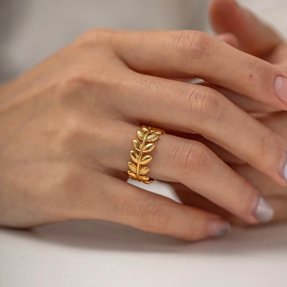 Twisted Vine Ring — adjustable gold-plated ring, flat lay