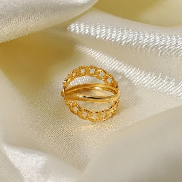 Crossed Band Ring — close-up of crossed band detail