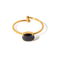 Obsidian Spark Ring — adjustable black zircon ring in 18k gold plating, front view