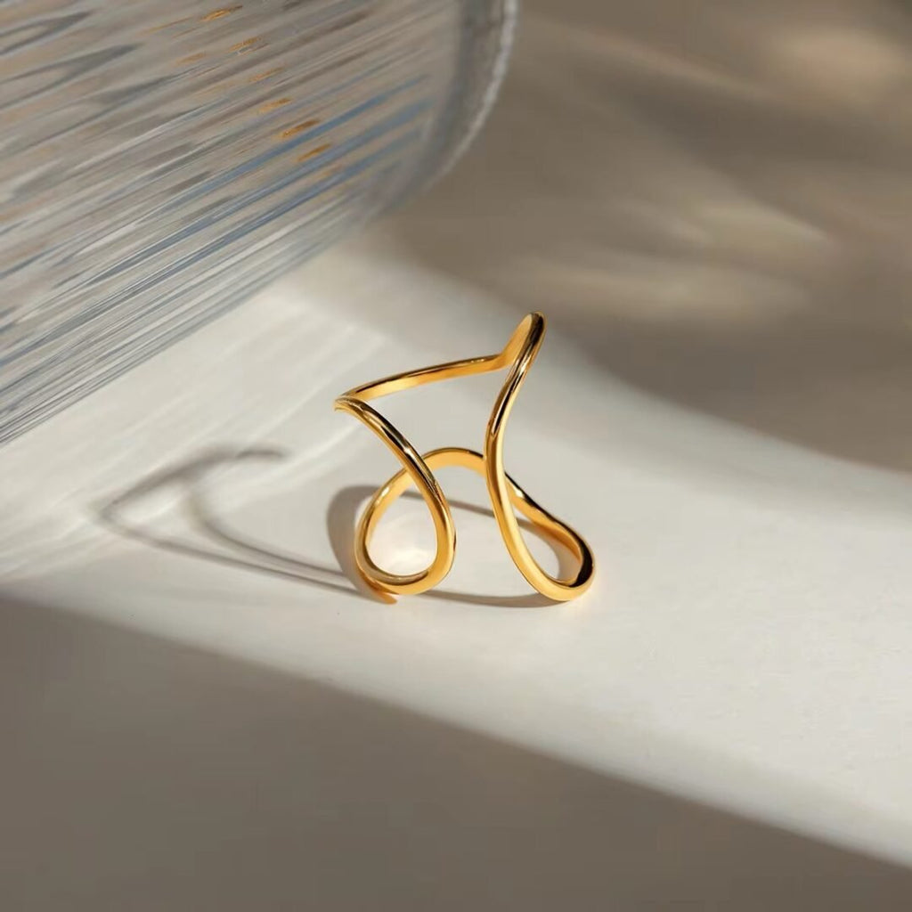 Misshaped Ring — organic-form gold ring worn on the finger