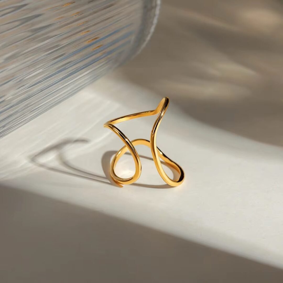 Misshaped Ring — organic-form gold ring worn on the finger