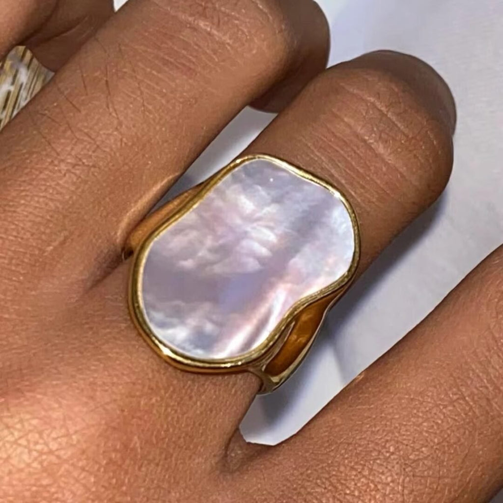 White Stone Ring — zircon solitaire ring worn on the finger
