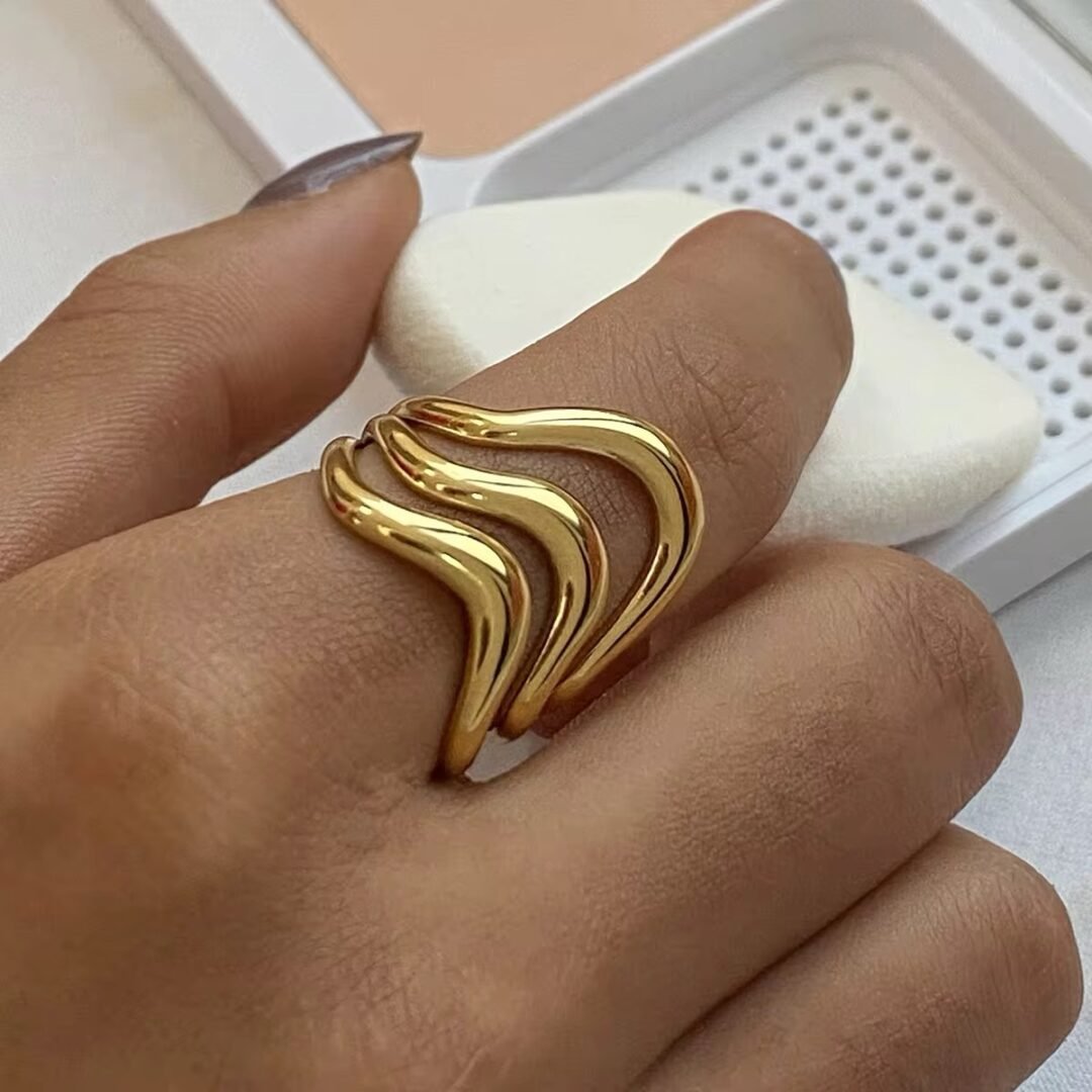 Third Wave — triple wave ring worn on the finger