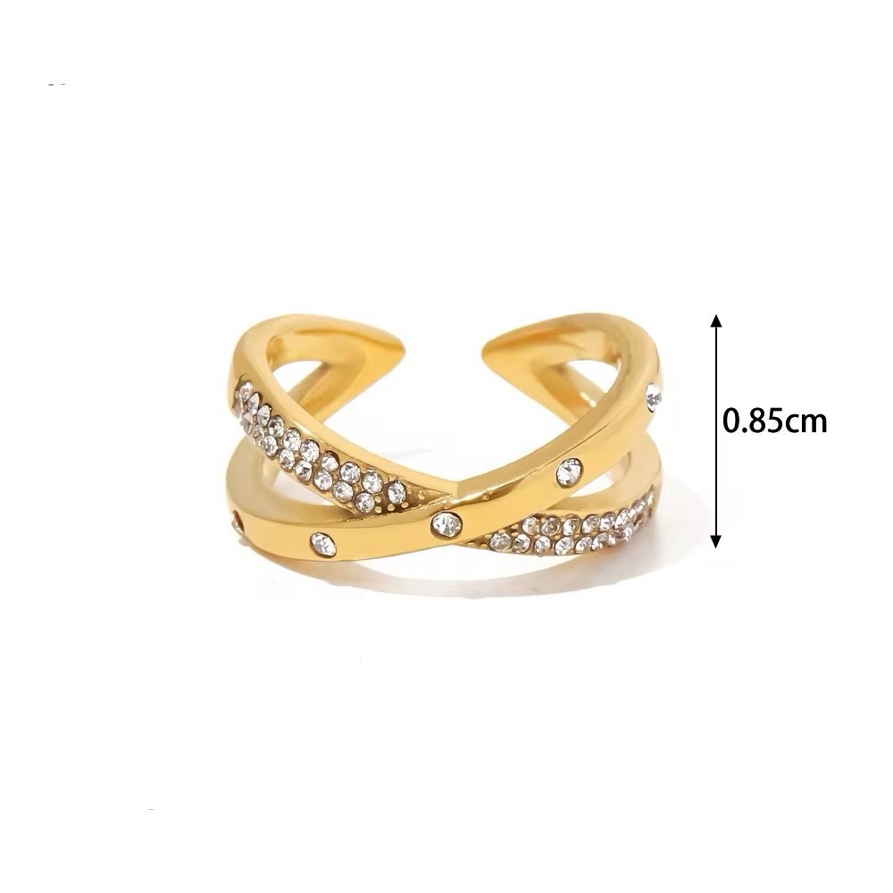Crossed Ring — close-up of crossing bands with zircon