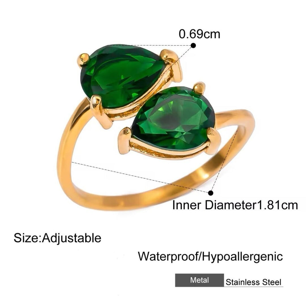 Two Souls Ring Emerald — close-up of the two angled green stones