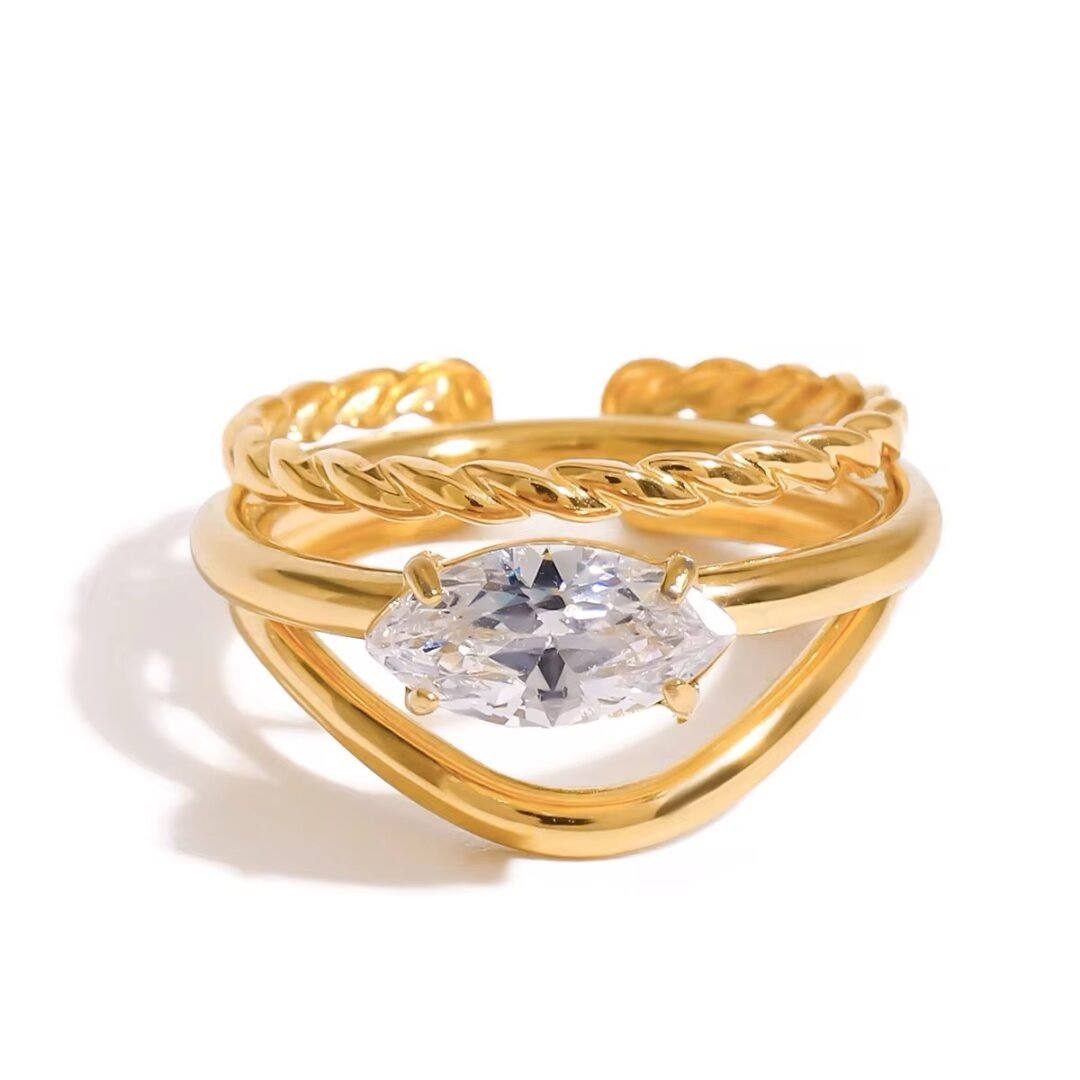 Dreamy Rings Set of 2 — two zircon stacking rings in 18k gold-plated stainless steel, front view