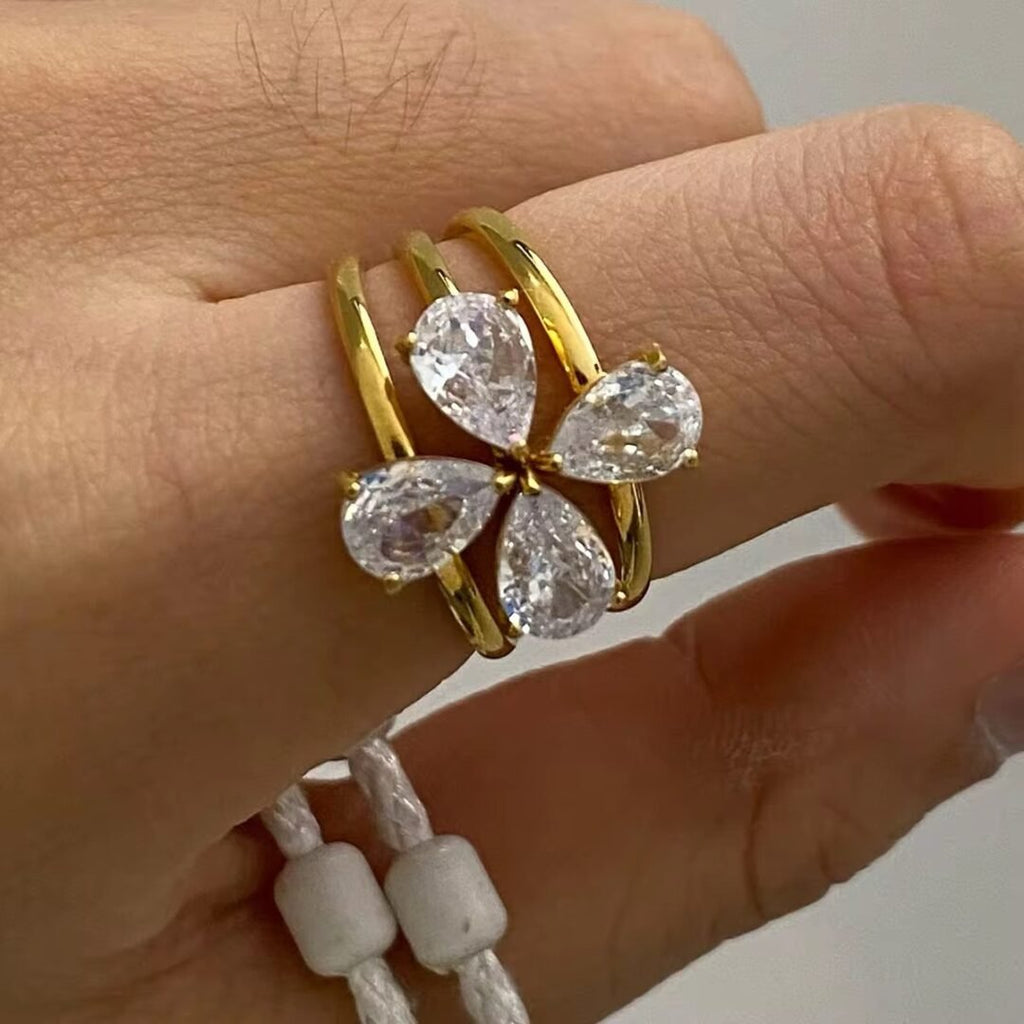 Clover Rings Set of 3 — rings stacked on one finger