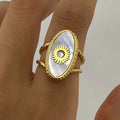 Ivory Sun Ring — ivory sunburst ring in 18k gold-plated stainless steel, front view