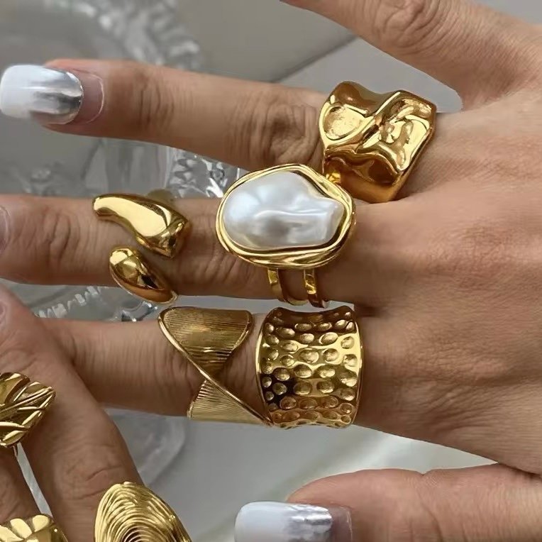 Hammered Ring — hammered gold ring styled on the hand