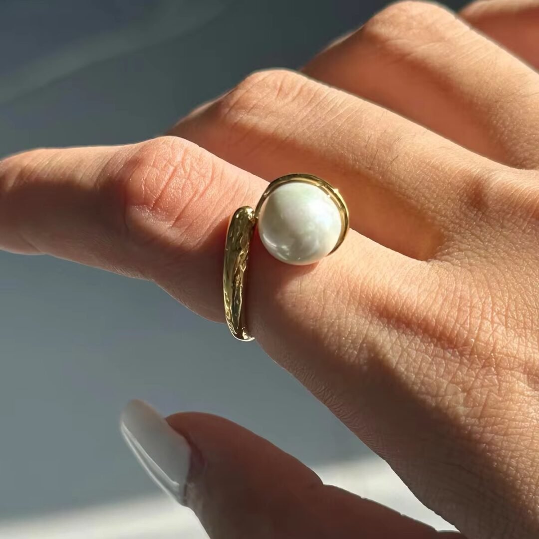 Pearl Sphere Ring — pearl ring worn on the finger