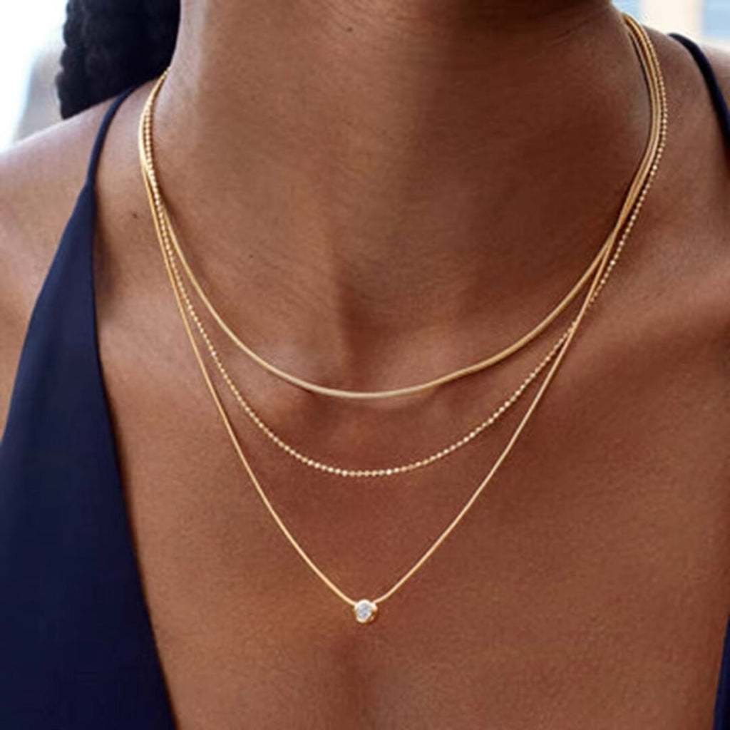 Three Layered Gem — layered necklace worn at the collarbone
