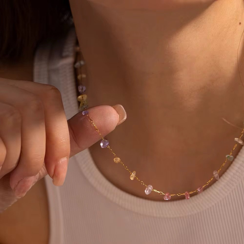 Fairy Rock Necklace — textured gold pendant worn at the collarbone