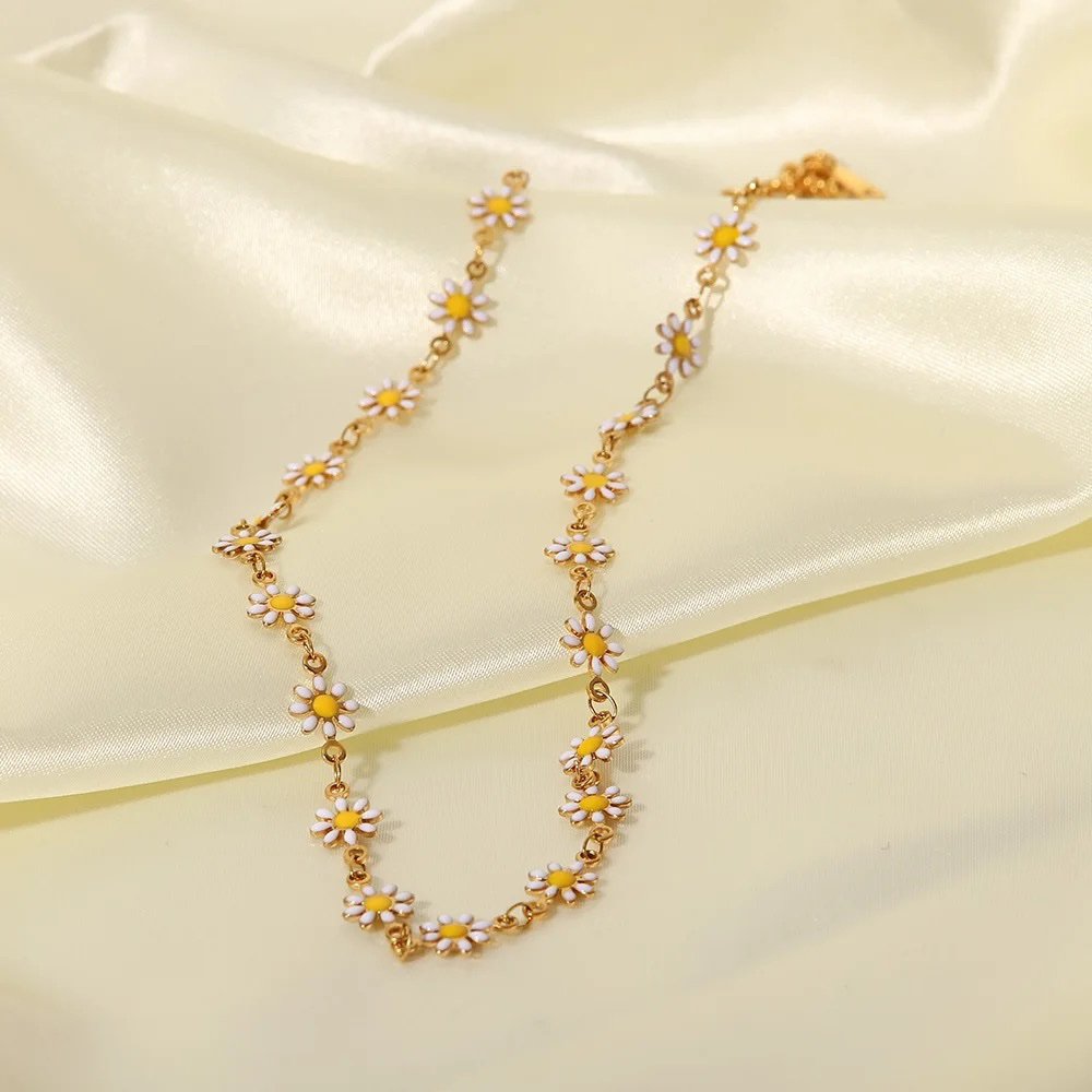 Daisies Necklace — daisy necklace styled flat lay