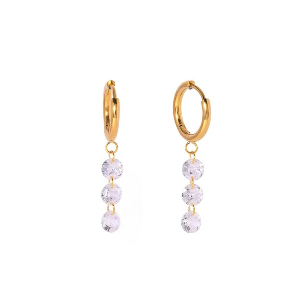 Twinkle Huggies — gold huggie hoops with a drop of three round zircons, front view