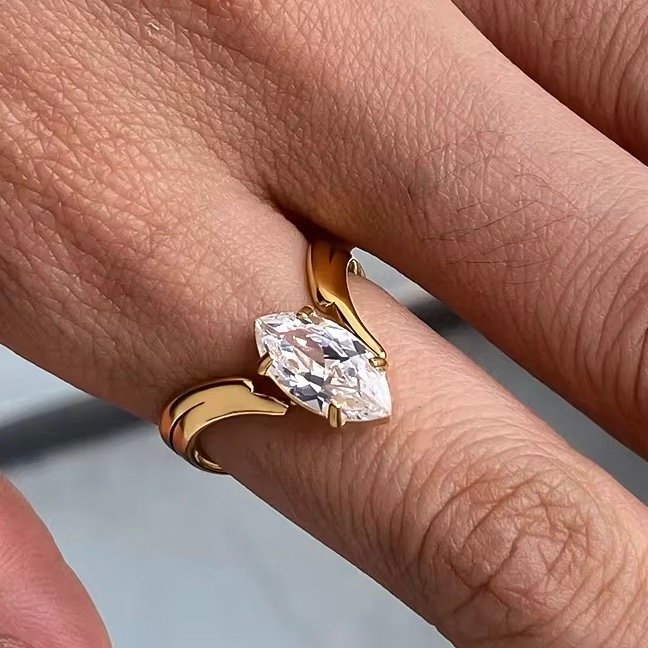 The Muse Ring — zircon band worn on the finger