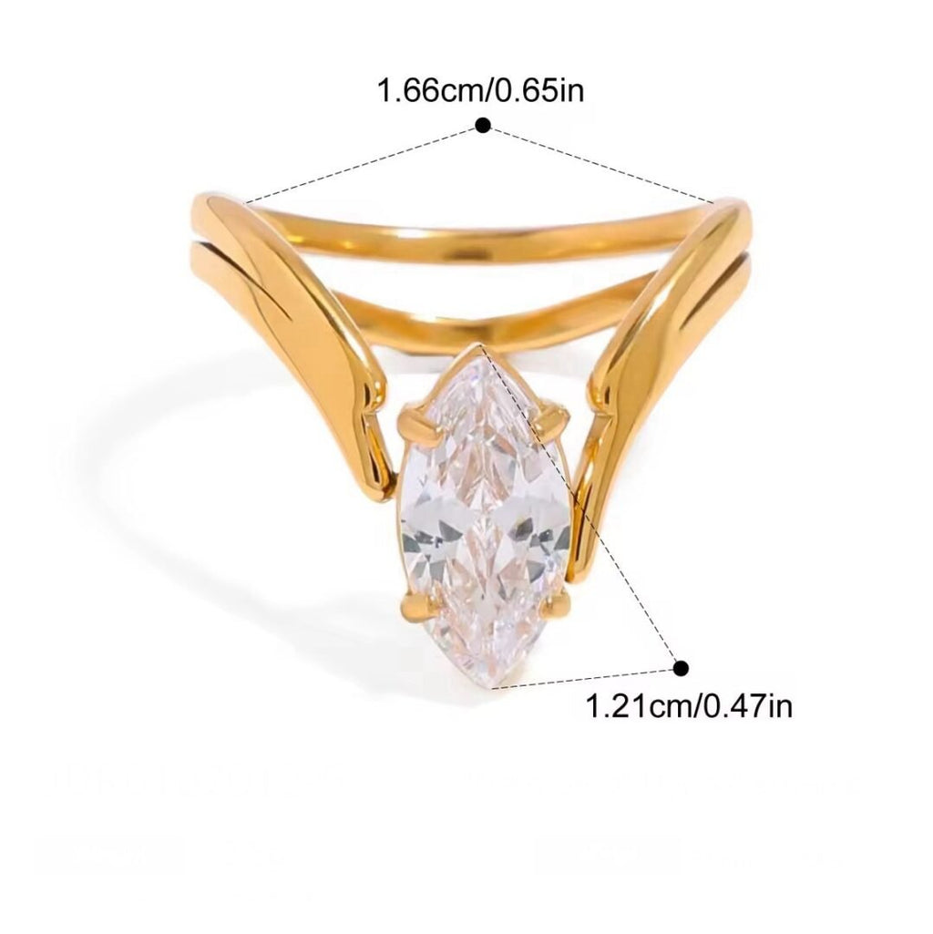The Muse Ring — gold zircon ring styled on the hand