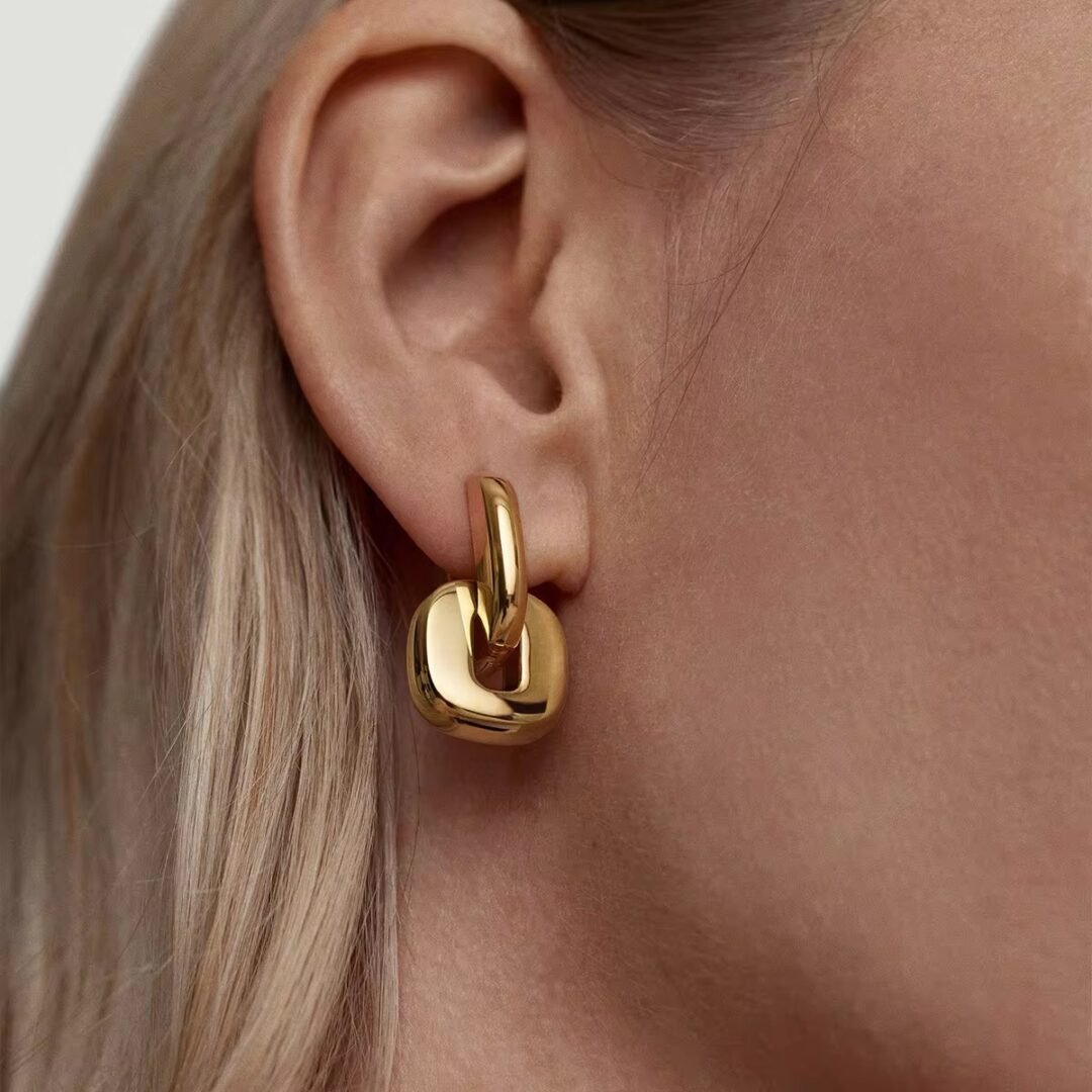 U Lock Earrings — U-shaped hoops worn on the ear