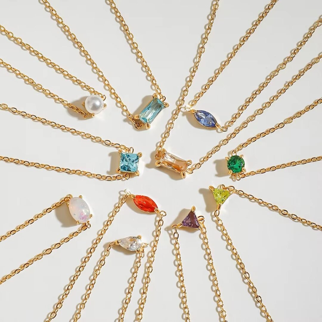 Gem Bracelets — single zircon chain bracelet in 18k gold-plated stainless steel, front view