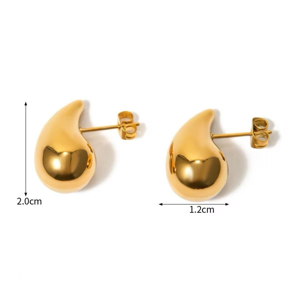 Mini Bodega Earrings — small gold earrings, flat lay