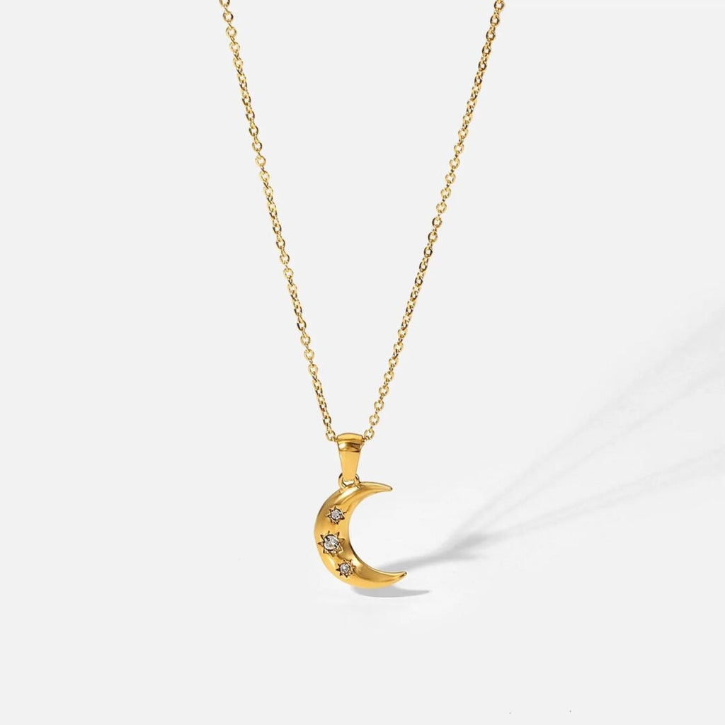 Crescent — zircon crescent moon pendant in 18k gold-plated stainless steel, front view