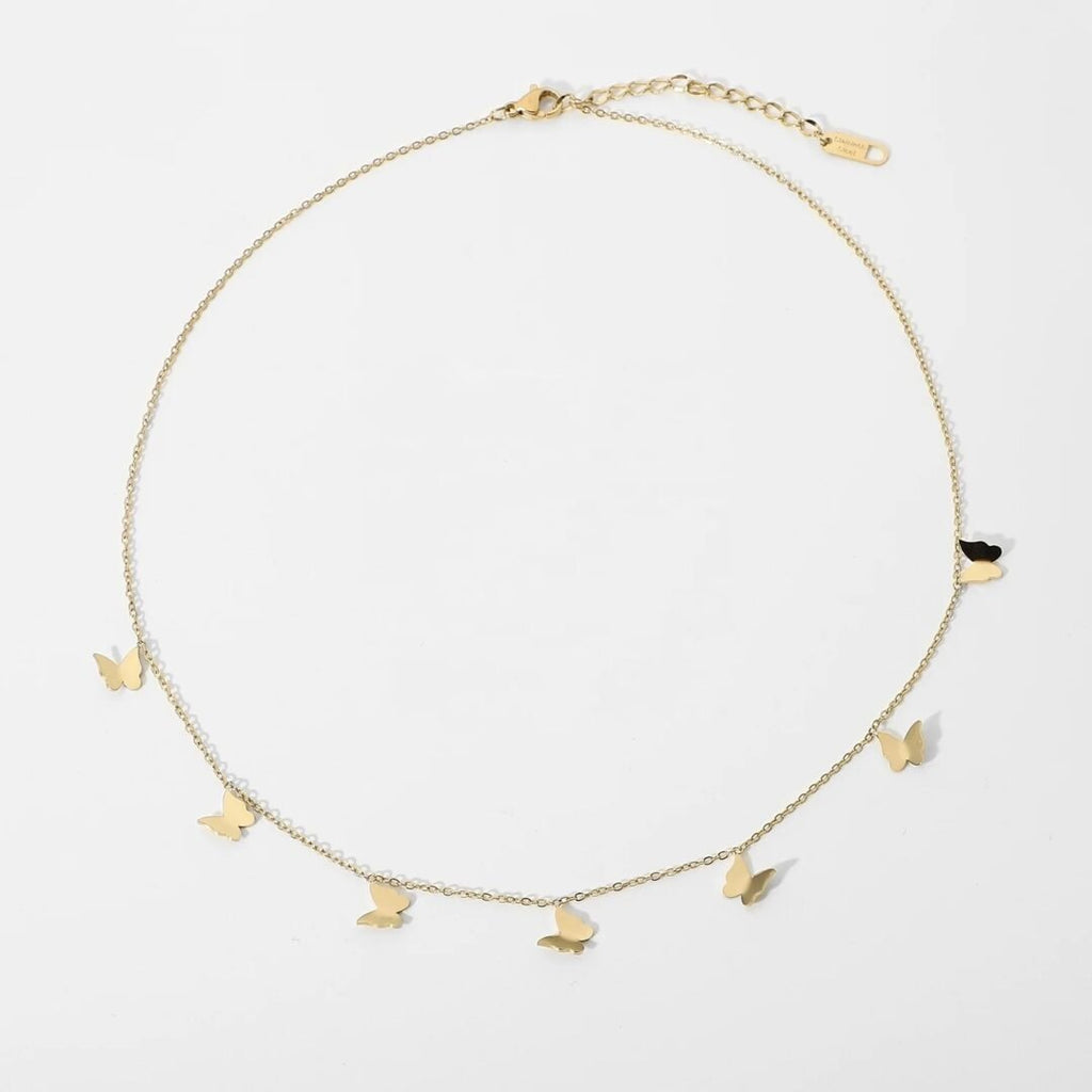 Mariposa — butterfly charm necklace in 18k gold-plated stainless steel, front view