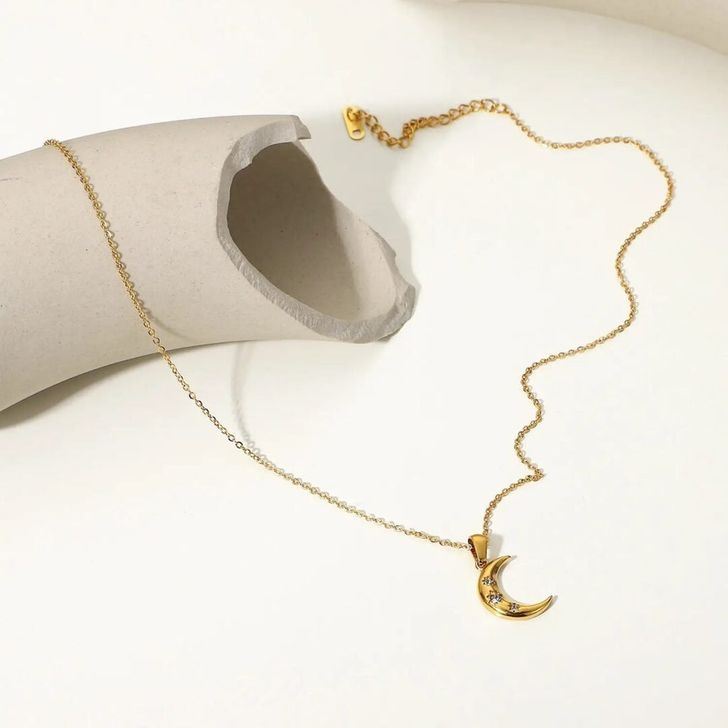 Crescent — zircon moon pendant on fine gold chain