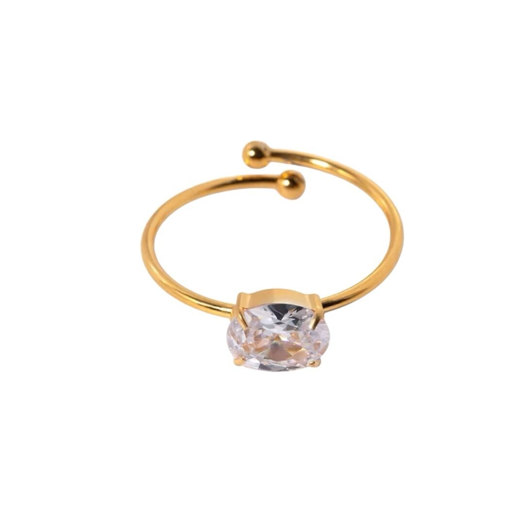 Crystal Spark Ring — clear zircon adjustable ring in 18k gold-plated stainless steel, front view