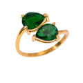 Two Souls Ring Emerald — emerald-green zircon twin stone ring in 18k gold-plated stainless steel, front view