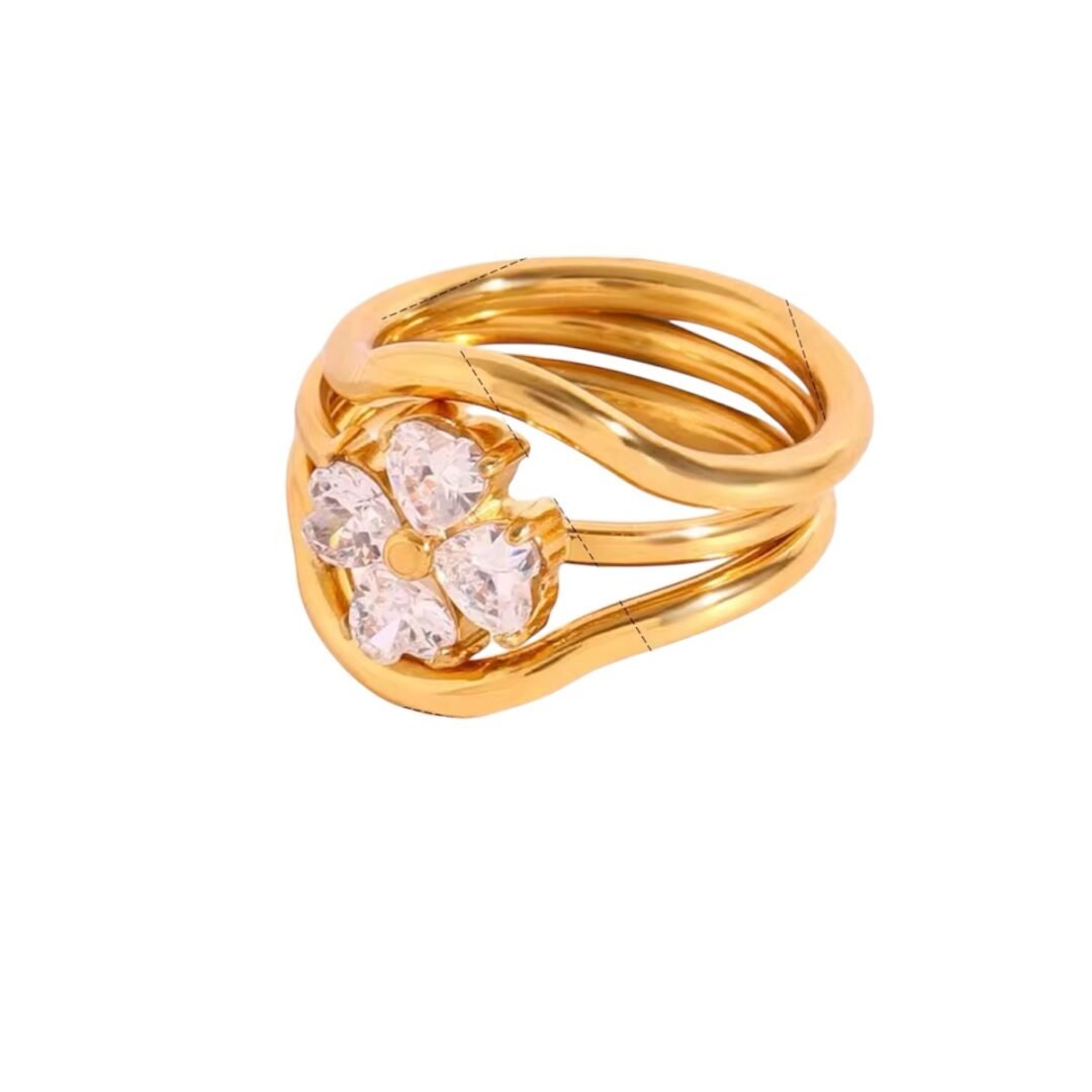 Mystic Flower Set of 3 — zircon flower ring set on a plain background