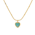 Aqua Heart — aqua blue zircon heart pendant in 18k gold-plated stainless steel, front view